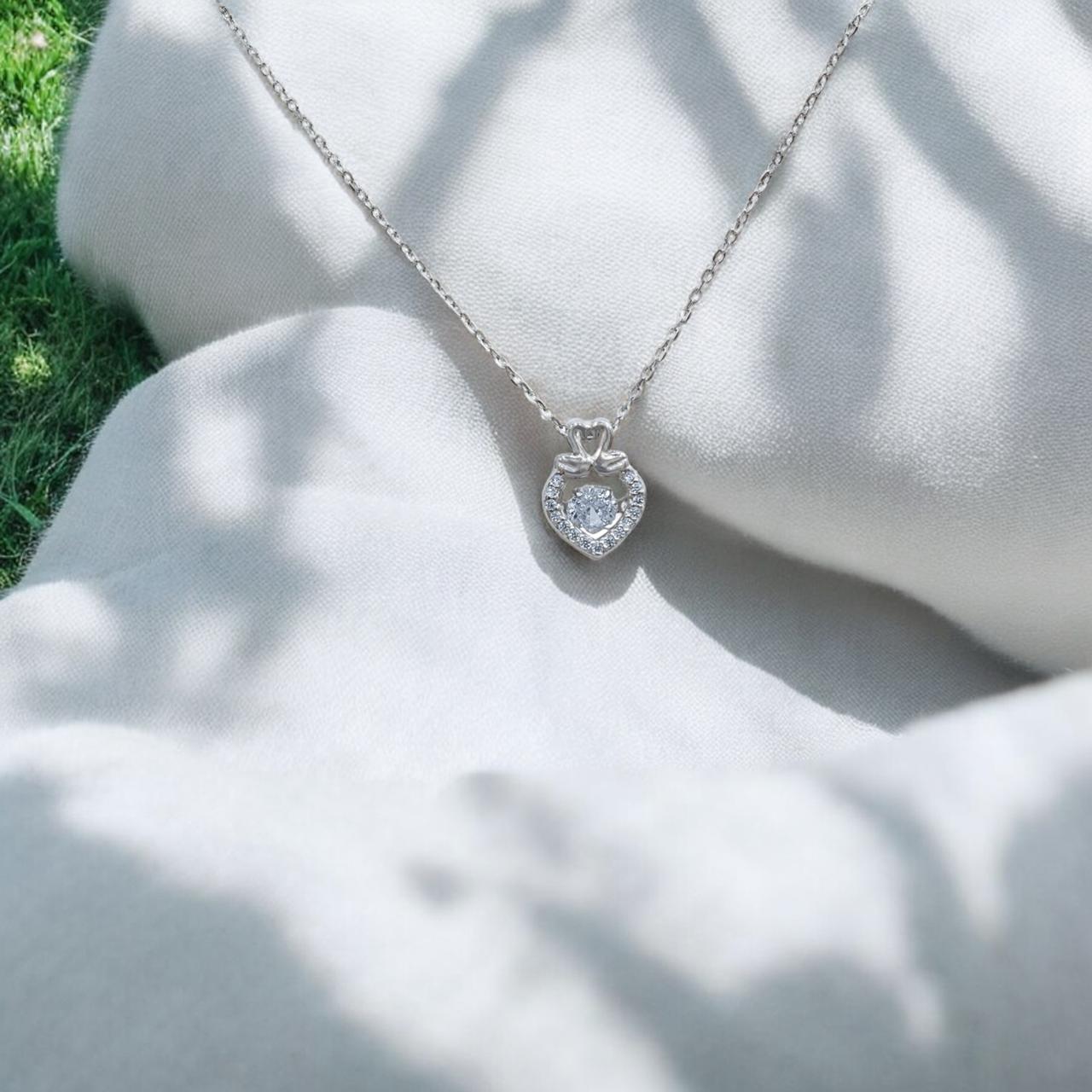 Swanâs Embrace Pendant