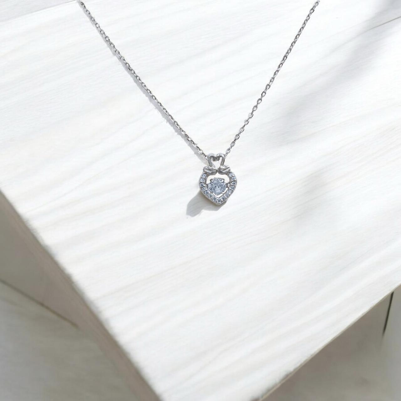 Swanâs Embrace Pendant